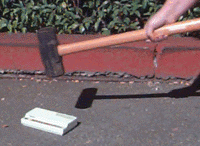 (picture of sledge hammer, about to hit Mr. Sportster)